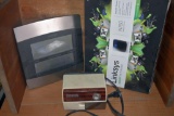 Linksys Wi-Fi Router, Digital Clock and Pencil Sharpener