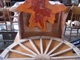 Wooden Clock and Plastic Wagon Wheel Wall Art