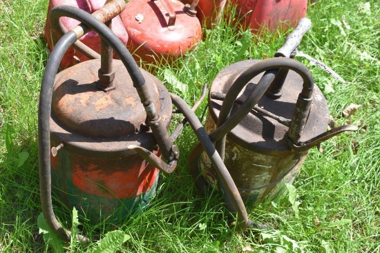 Two grease pails with pumps