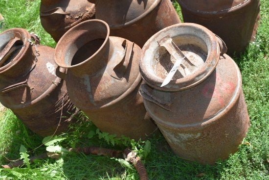 Three Milk cans, two with lids