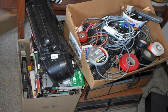 Large Assortment of VHS Tapes, RCA CD Player, Assorted Phone Chargers, Electrical Tape, and More