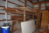 Large Assortment of Lumber on Wooden Rack, Chip Board, 2