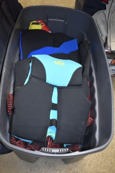 Rubbermaid Tote Containing Assorted Life Jackets