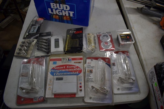 Assortment of Siding Overlap Gauges, Thermostats, Door Stops