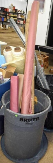 Brute Garbage Can with Lid Containing Assorted Paper Rolls