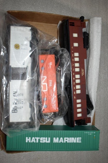 Flat Containing Unboxed Passenger Car, Caboose, Reefer