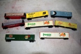 (6) Assorted HO Scale Box Cars, (2) Assorted HO Scale Flat Cars with Cargo