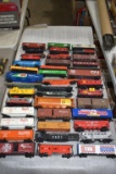 Assorted HO Scale Railroad Cars: Box Cars, Material Car, Flat Cars