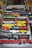 Assorted HO Scale Railroad Cars: Tanker Cars, Material Cars, Flat Cars