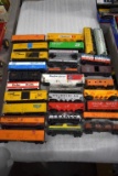 Assorted HO Scale Railroad Cars: Box Cars, Material Cars, Tanker Cars