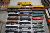 Assorted HO Scale Railroad Cars: Material Cars, Box Cars, Tanker Cars