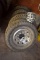 (4) 265x75x16 Goodyear Wrangler Tires on 8 Bolt Rims with (3) Center Caps