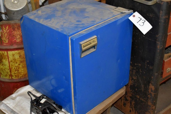 Welding Rod with Small Refrigerator and Wood Stand