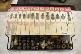 Hydraulic Coupler Display with Many New and Used Hyd. Couplers