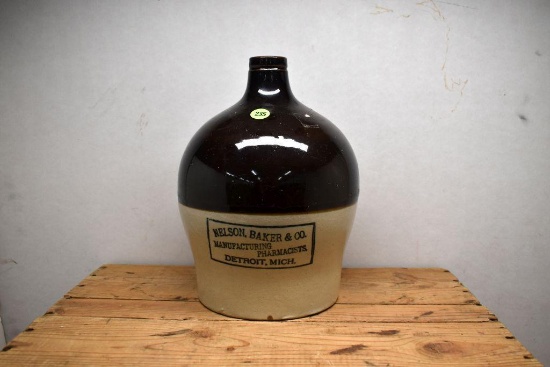 Brown op Advertising Jug, "Nelson, Baker & co. Manufacturing Pharmacists, Detroit, Mich."