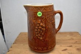 Brown Grape Pitcher, Chipped on rim, Marked Star on Bottom, 9