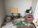 Misc. planters, garden hose,