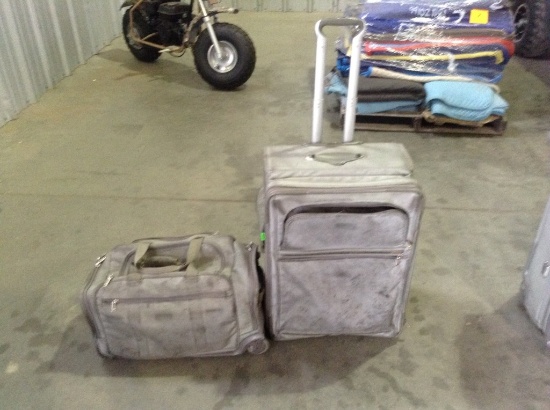 (2) Roll Around Pieces of Luggage