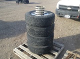 (4) GMC 265/70R17 Rims and Tires w/Caps