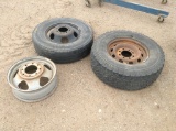 2 Truck Tires w/Rubber and 1 Rim
