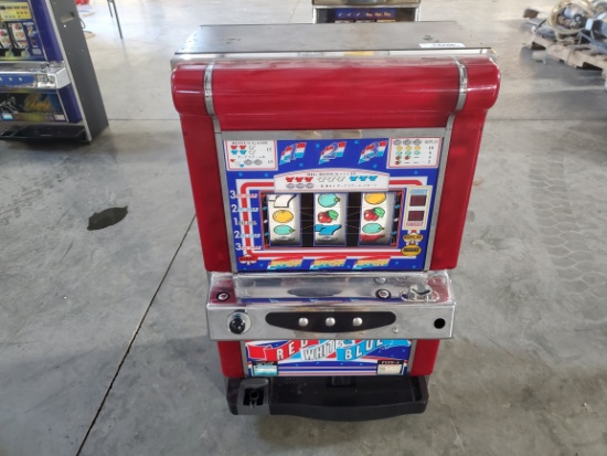Red, White, and Blue Electronic Coin Machine