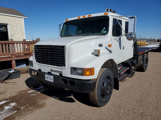 1999 INTERNATIONAL 4700 Conventional Cab Chassis Flatbed Truck