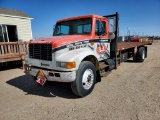 1998 International 4900  80 Inch Wide Steel Cab 68 ABC  24' Hydraulic Flatbed Truck
