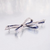 Platinum ‘Bow’ Motif Pin, Crusted With over 2 Carats Of Diamonds And Sapphi