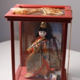 Small Ming Dynasty Doll in Glass