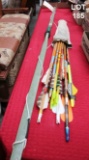 TALL GREEN BOW WITH LOT OF ARROWS