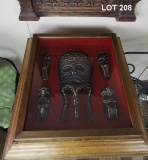 GLASS CASE WITH VINTAGE MASK COLLECTION