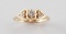 14KT YELLOW GOLD DIAMOND RING W HEART .14 TCW