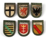 GROUPING OF 6 WWII GERMAN NSDAP WHW DONATION BADGE