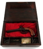 ANTIQUE WRITING SLOPE W PERCUSSION PISTOL IN SLOT