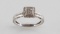 10KT WHITE GOLD AND ROUND CUT DIAMOND RING