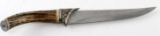 GERMAN STYLE ETCHED HUNTING KNIFE WITH 12GA POMMEL