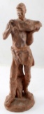 PLASTER SCULPTURE OF MAN CARRYING LOG R. ABEL