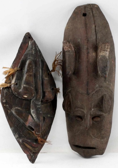 LOT OF TWO CARVED SHIELD  SHAPED AFRICAN MASKS