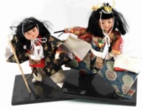 LOT OF TWO KYUGETSIU JAPANESE DOLLS ON STANDS