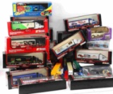 LOT OF ASSORTED NASCAR TRANSPORTERS & CART BANKS