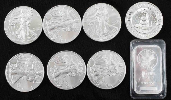 6 SILVER AMERICAN EAGLES 2 OZ ROUND AND 1 OZ INGOT
