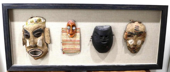 FRAMED LOT OF 4 AFRICAN CEREMONIAL DANCE MASKS