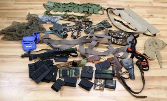 LARGE LOT OF HOLSTERS AMMO SLEEVES RIFLE REST LOT