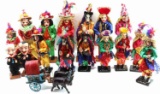 LARGE LOT OF NICARAGUAN WOODEN DOLLS ON STANDS