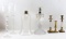 LOT OF SEVEN CANDLESTICKS & GLASS LAMP COVER