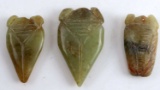 THREE CHINESE GREEN SOAPSTONE PENDANTS