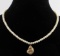 PEARL NECKLACE WITH 14 KT GOLD OYSTER PENDANT