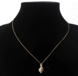 10KT GOLD NECKLACE WITH DIAMOND CLUSTER PENDANT