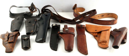 VARIOUS HOLSTERS WITH RIFLE STRAP KNIFE AND BELTS