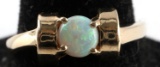 14KT GOLD AND OPAL SOLITAIRE CABOCHON RING